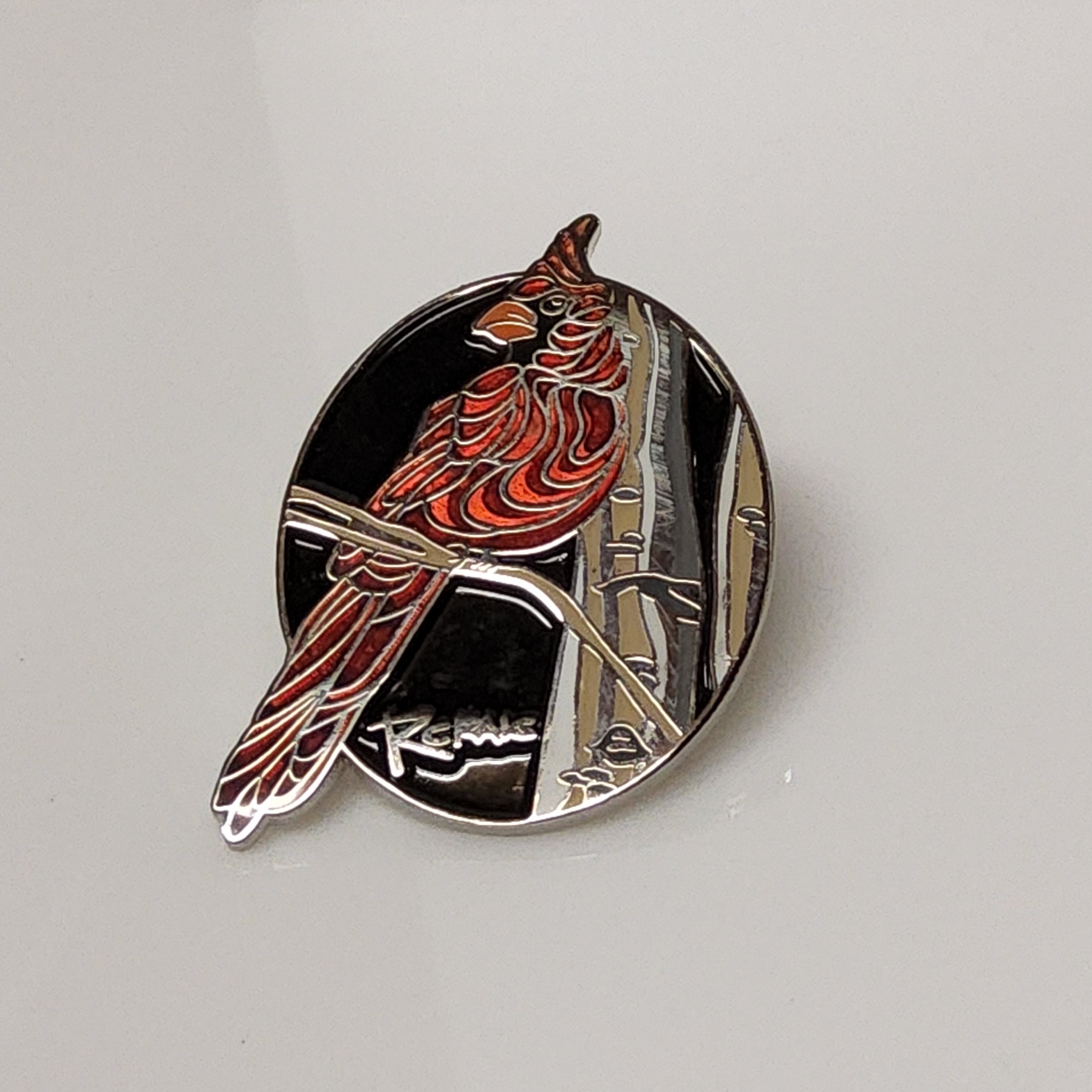 Cardinal Pin featuring artwork by Canadian Artist Robbie Craig