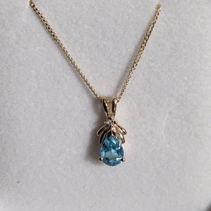 Pear Shape Cut Blue Topaz Pendant with Diamond Accent - P1241G