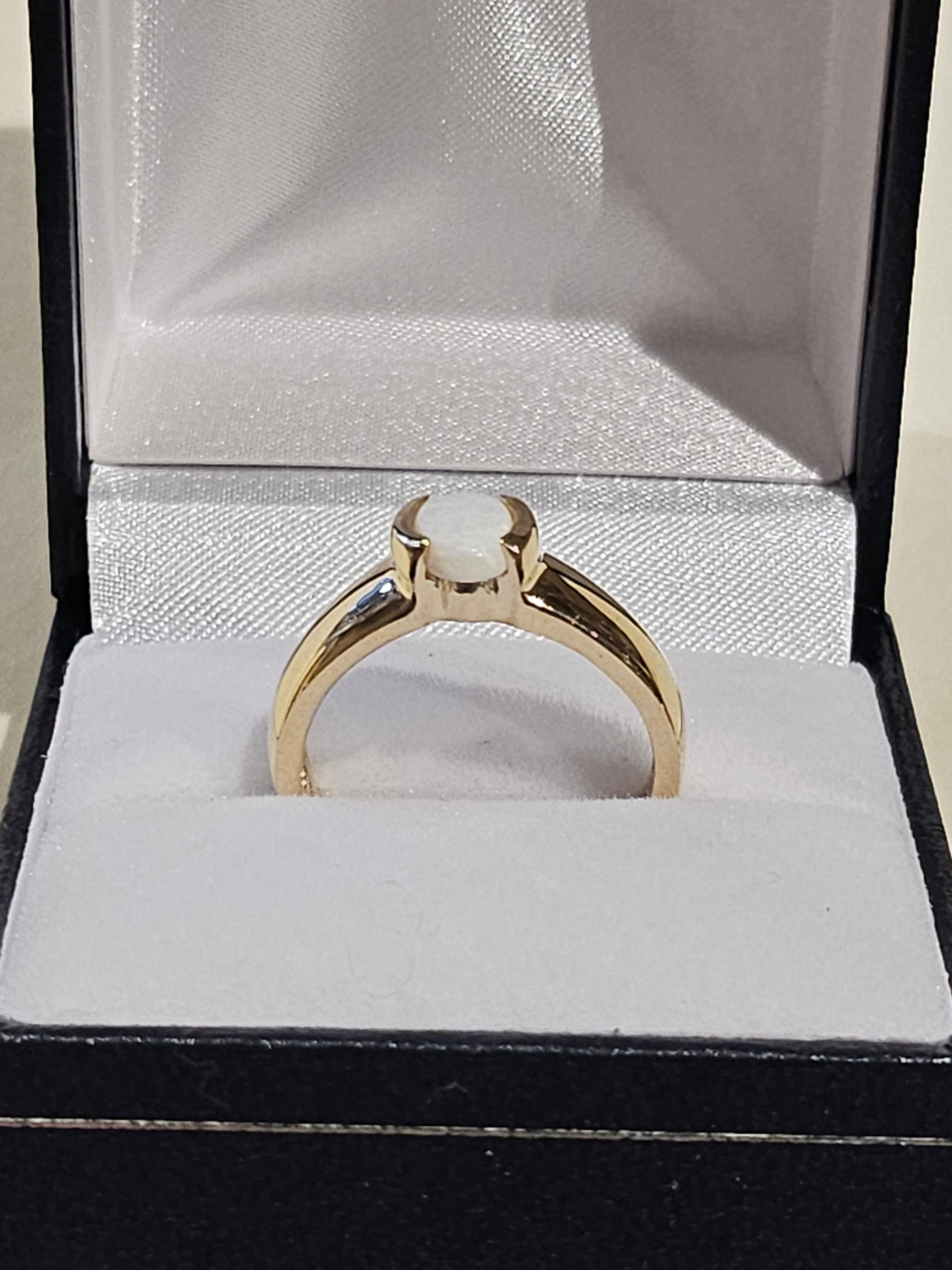 Oval Cut Opal Ring - $1288