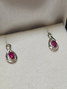 Oval Cut Ruby Earrings - EWD8634