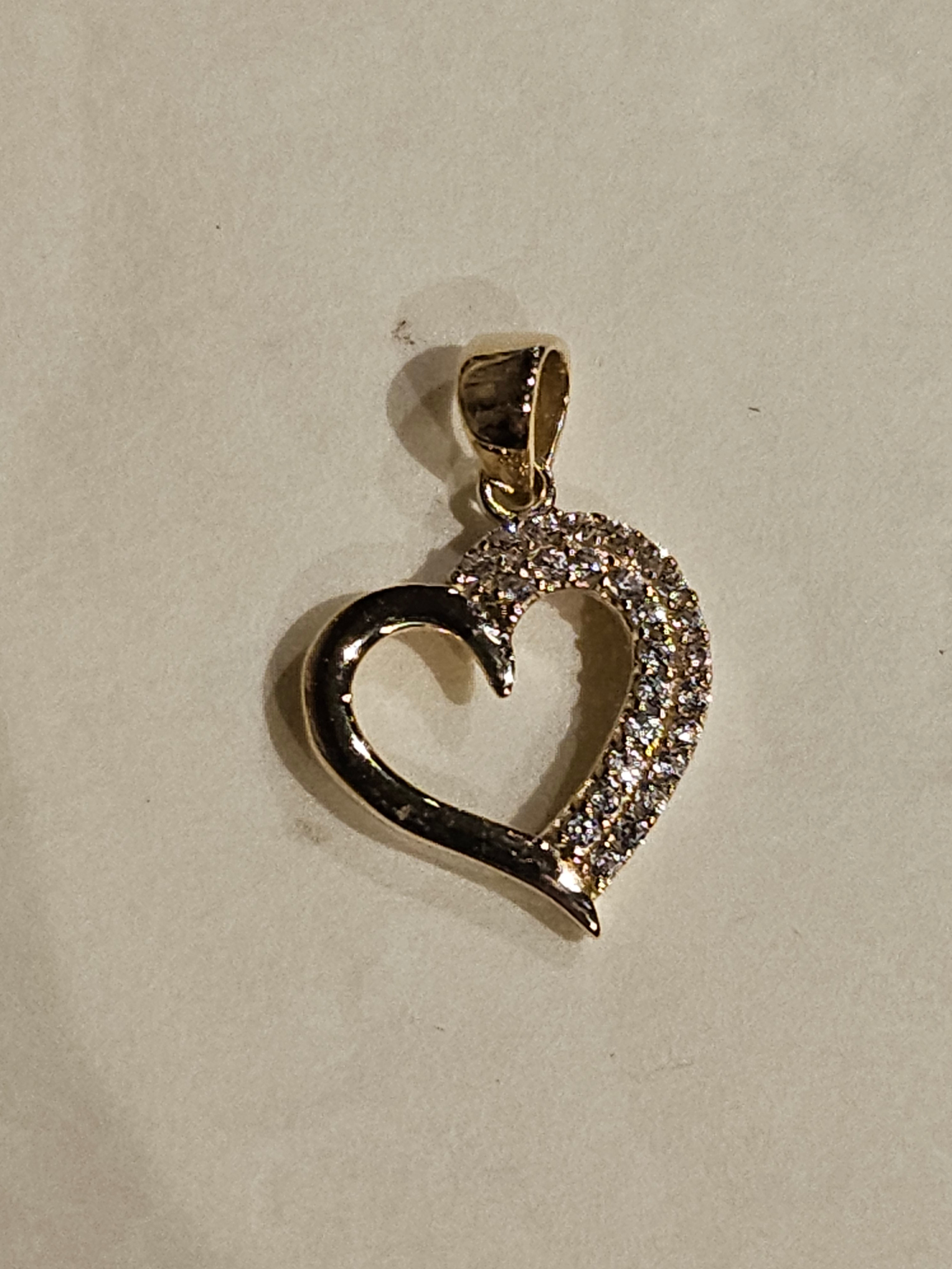 Gold Charm - Heart with one-half side featuring cubic zirconia - 2137