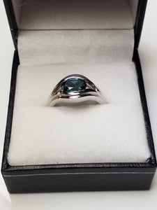 Oval Cut Blue Topaz Ring