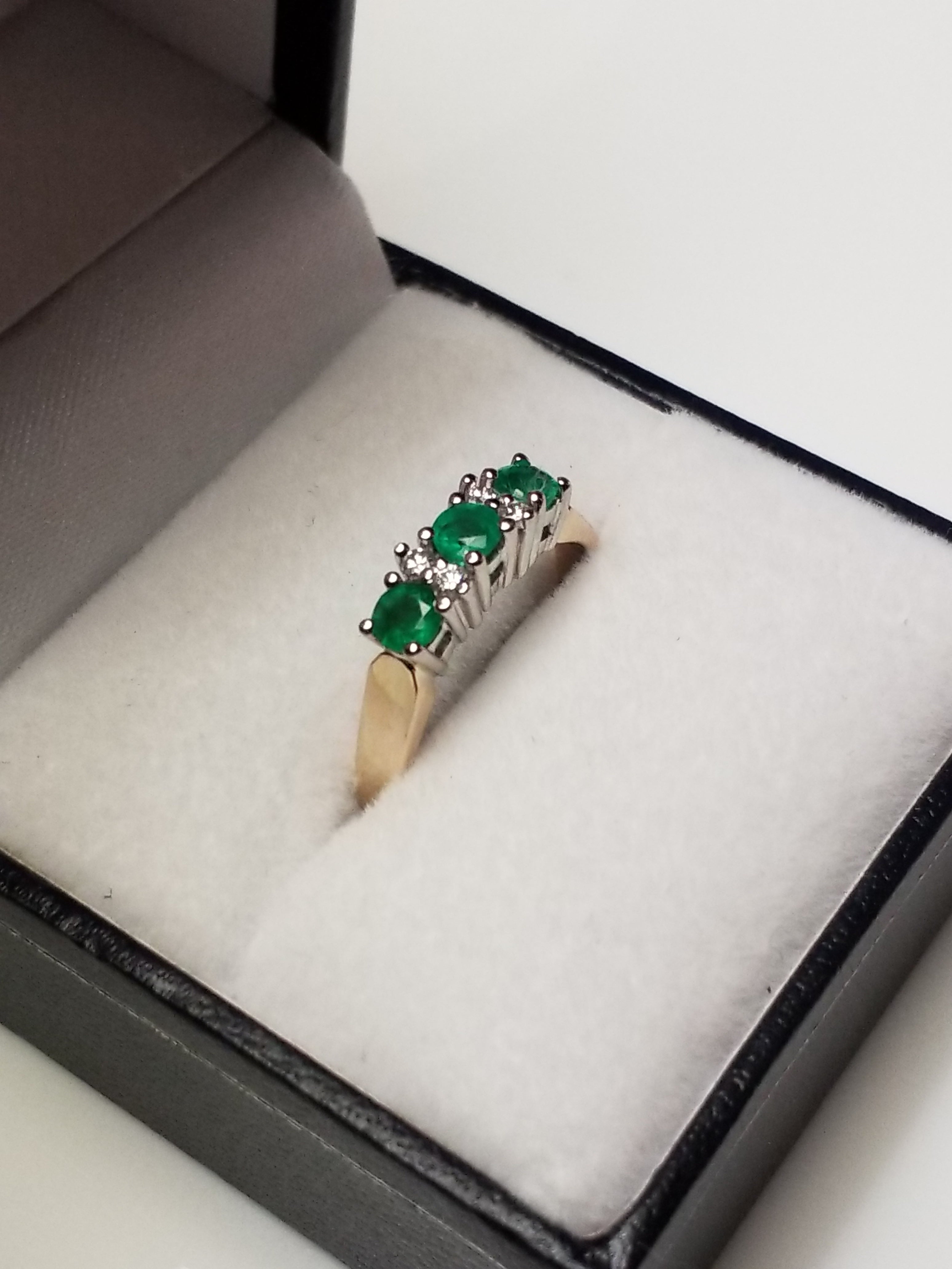 Three Round Cut Emeralds Ring with Diamonds