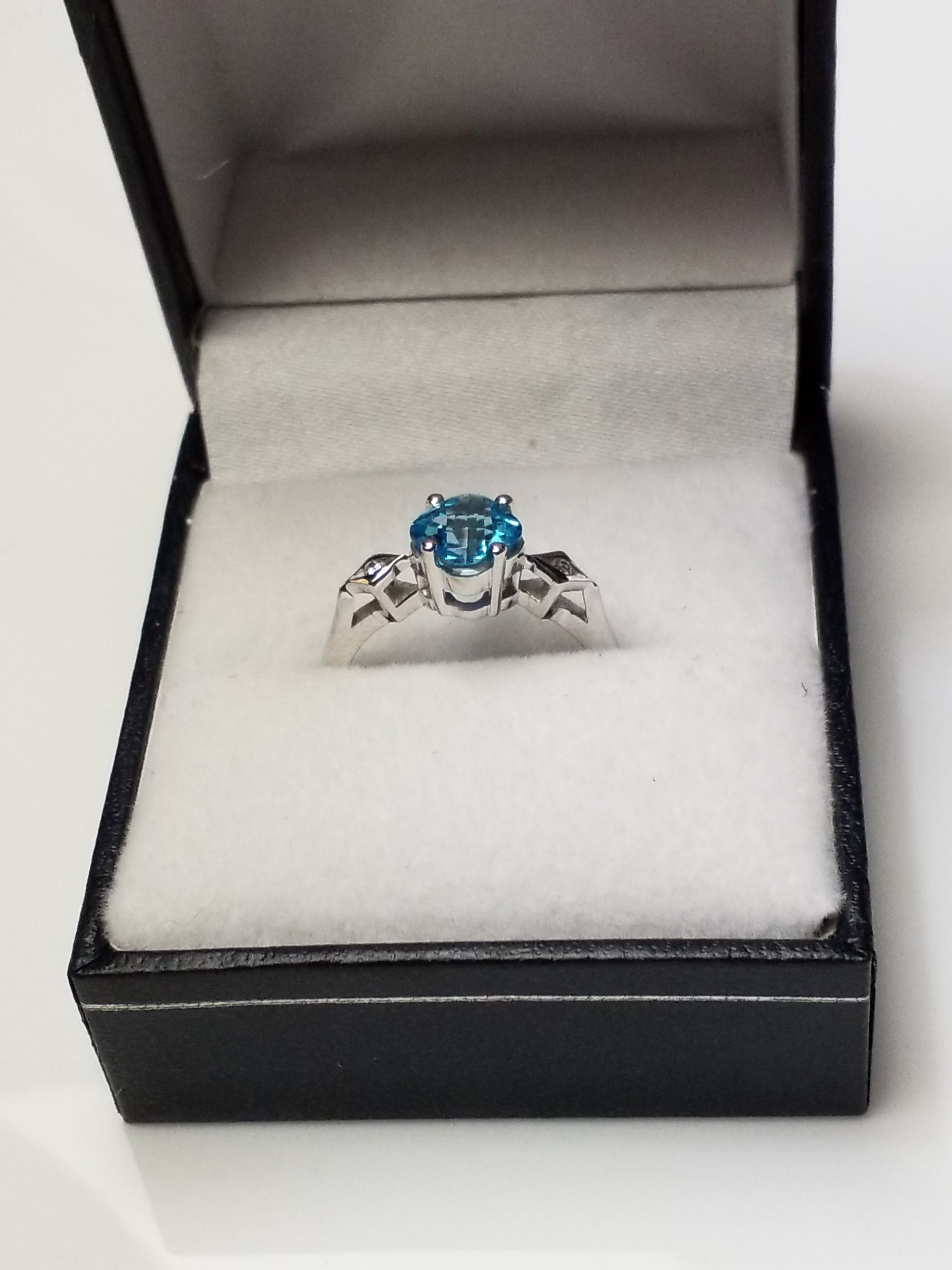 Round Blue Topaz Ring with Diamond Accents