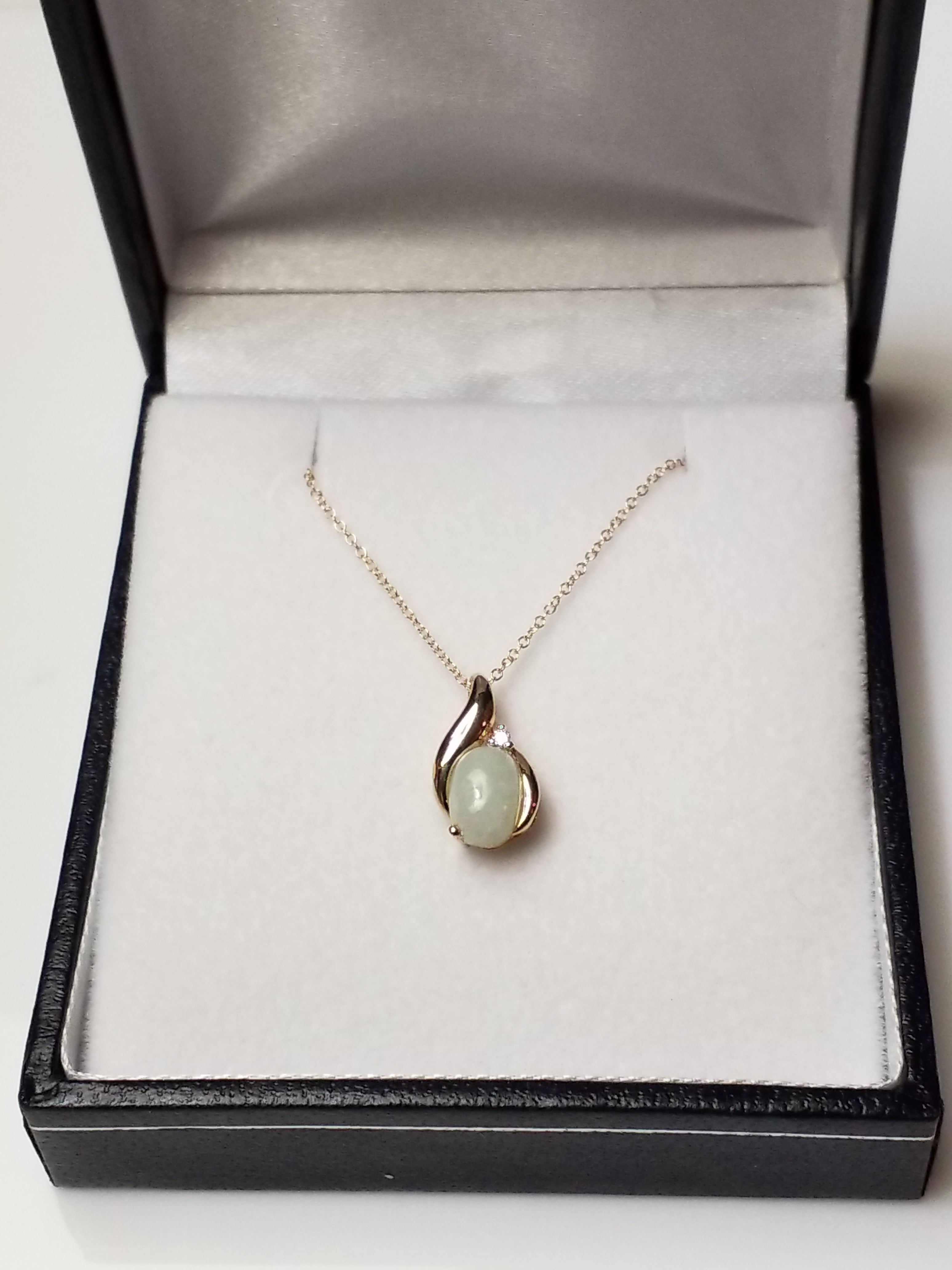 Oval Cut Jade Pendant with Diamond