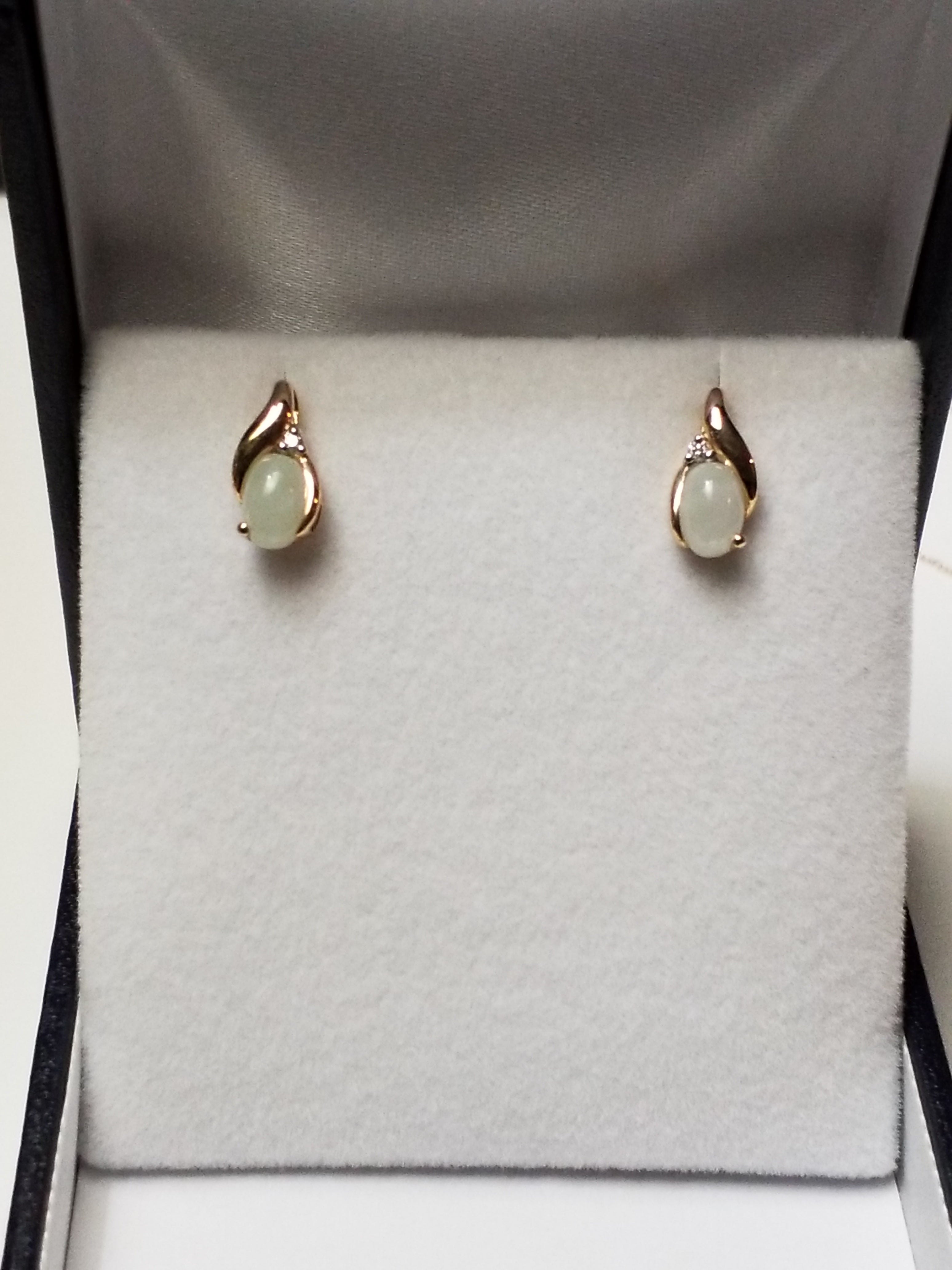 Oval Cut Jade Earrings with Diamonds