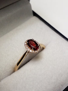Oval Cut Garnet Ring with Diamonds