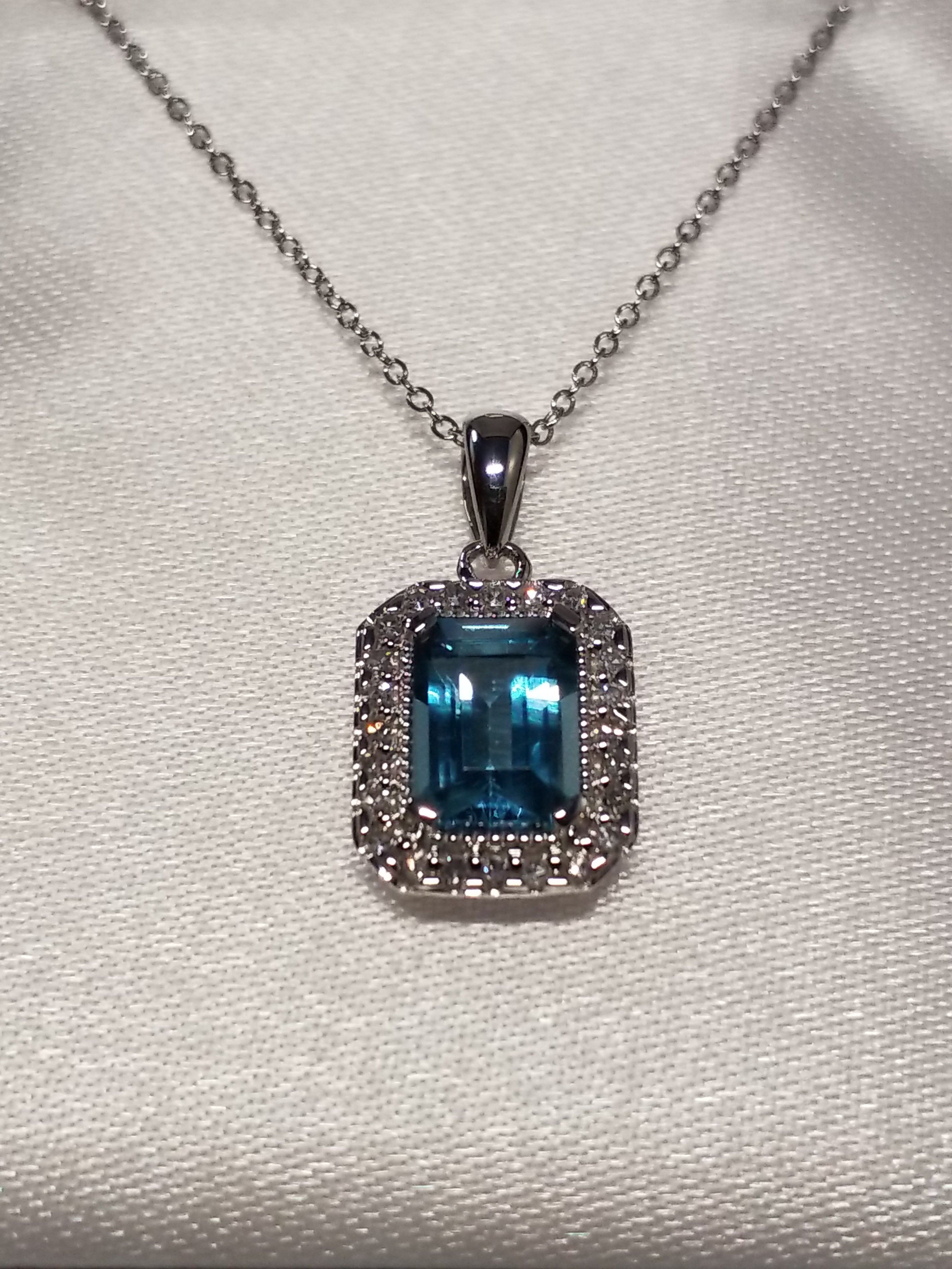 Emerald Cut Blue Topaz Pendant with Diamonds