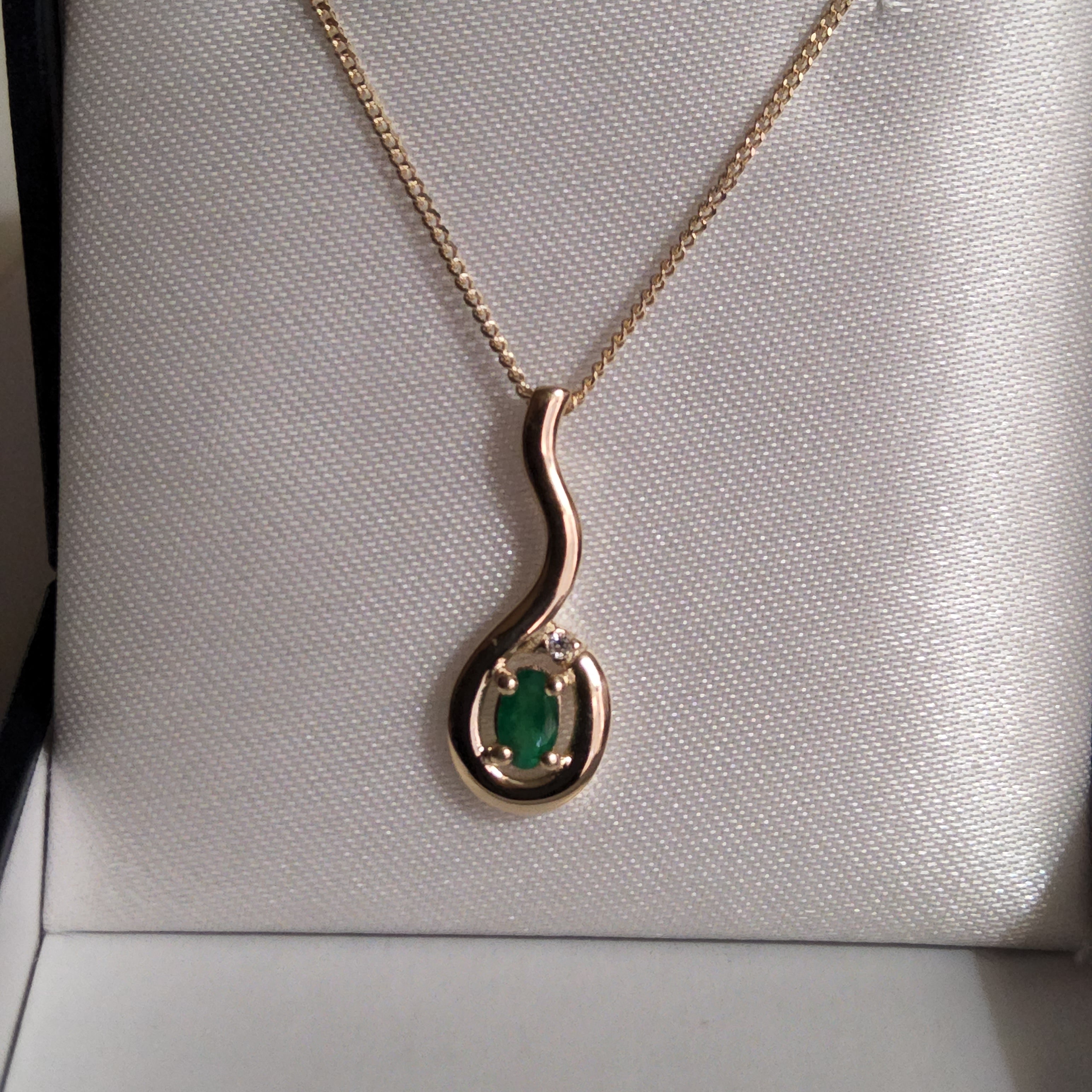 Oval Cut Emerald Pendant with Diamond