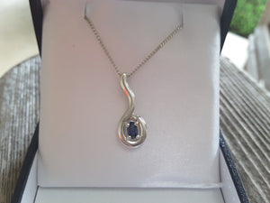 Oval Cut Sapphire Pendant with Diamond Accent