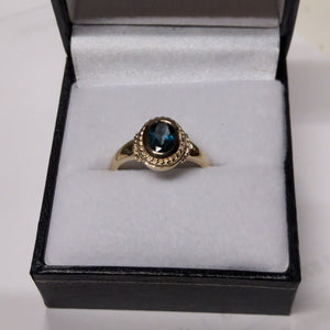 Oval Cut Blue Topaz Ring