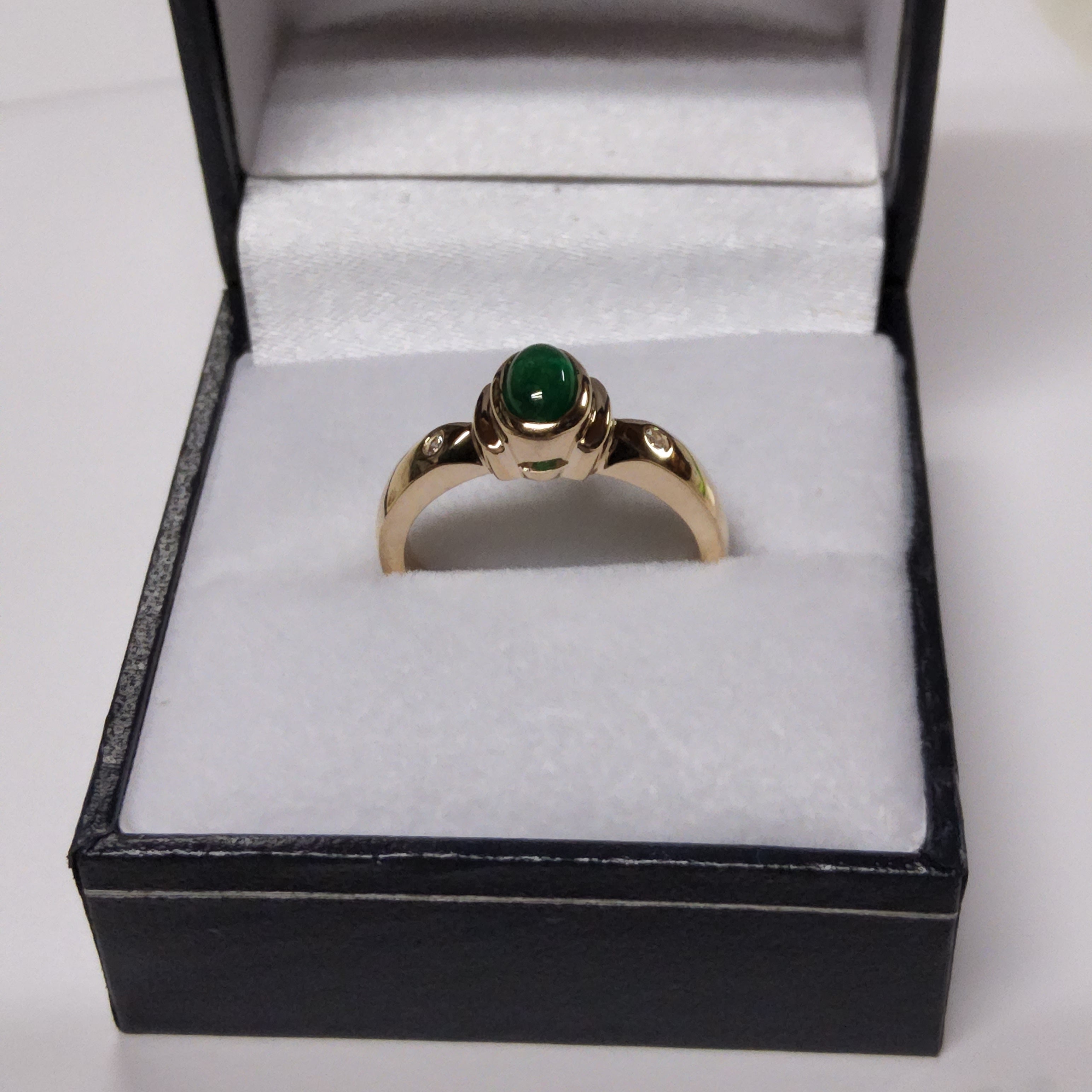 Cabochon Cut Emerald Ring with Diamonds