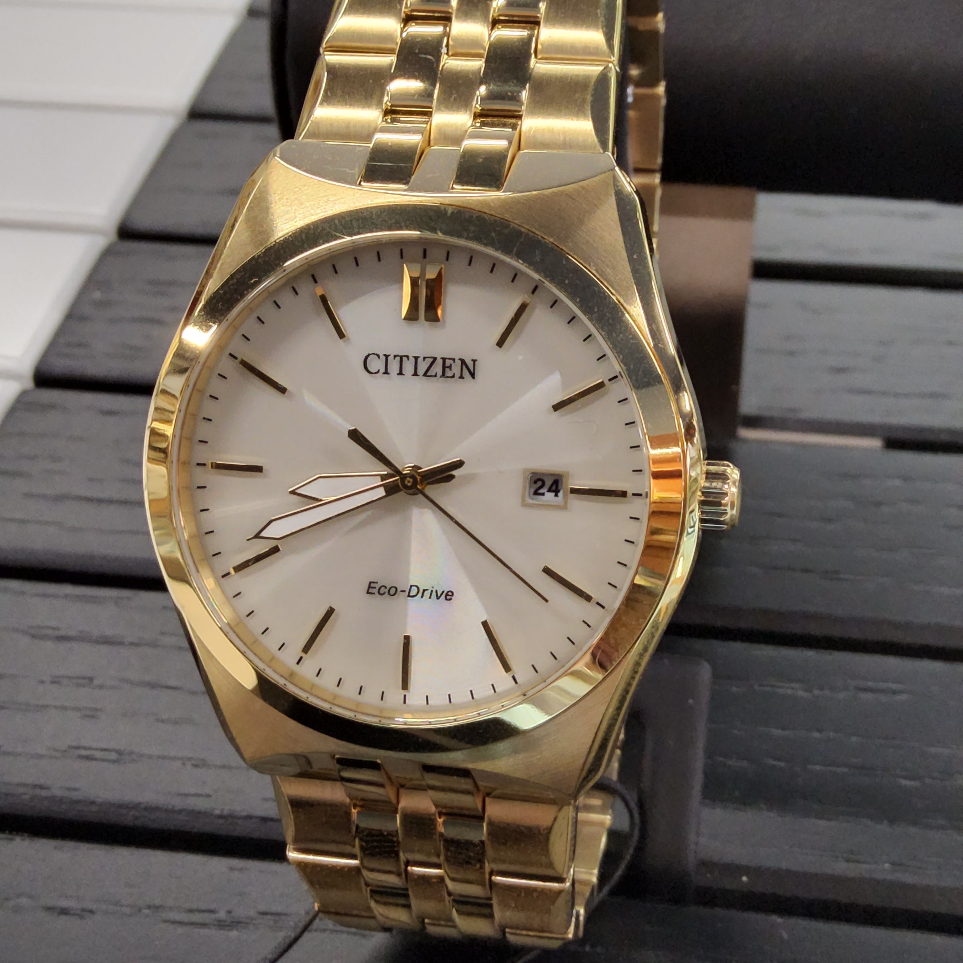 Stainless steel discount and gold watch