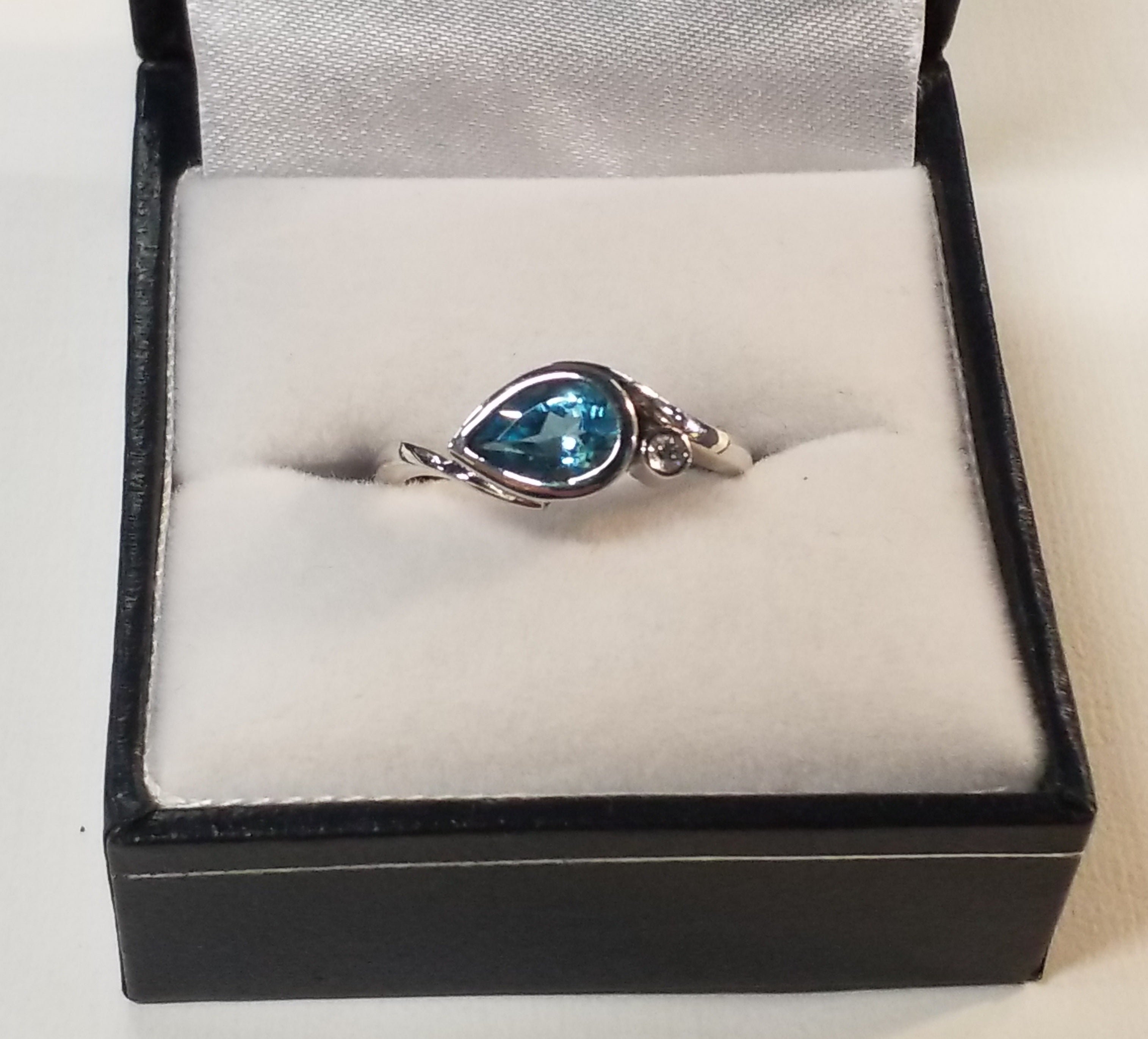 Pear Shape Cut Blue Topaz Ring with Diamond Accents