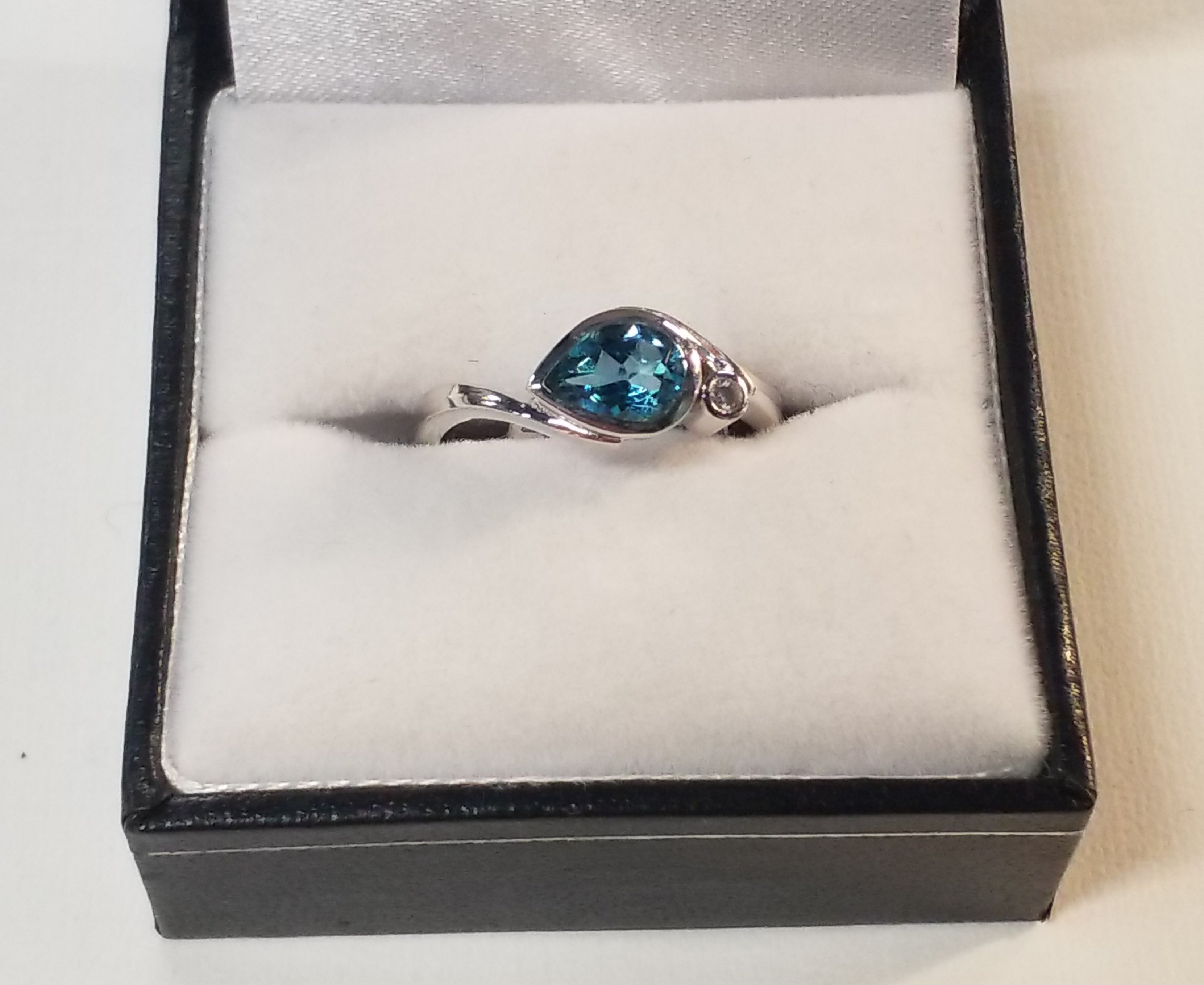 Pear Shape Cut Blue Topaz Ring with Diamond Accents