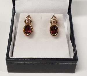 Two Oval Cut Garnet Earrings