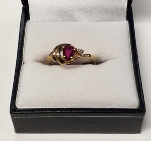 Pear Shape Ruby Ring and Diamonds