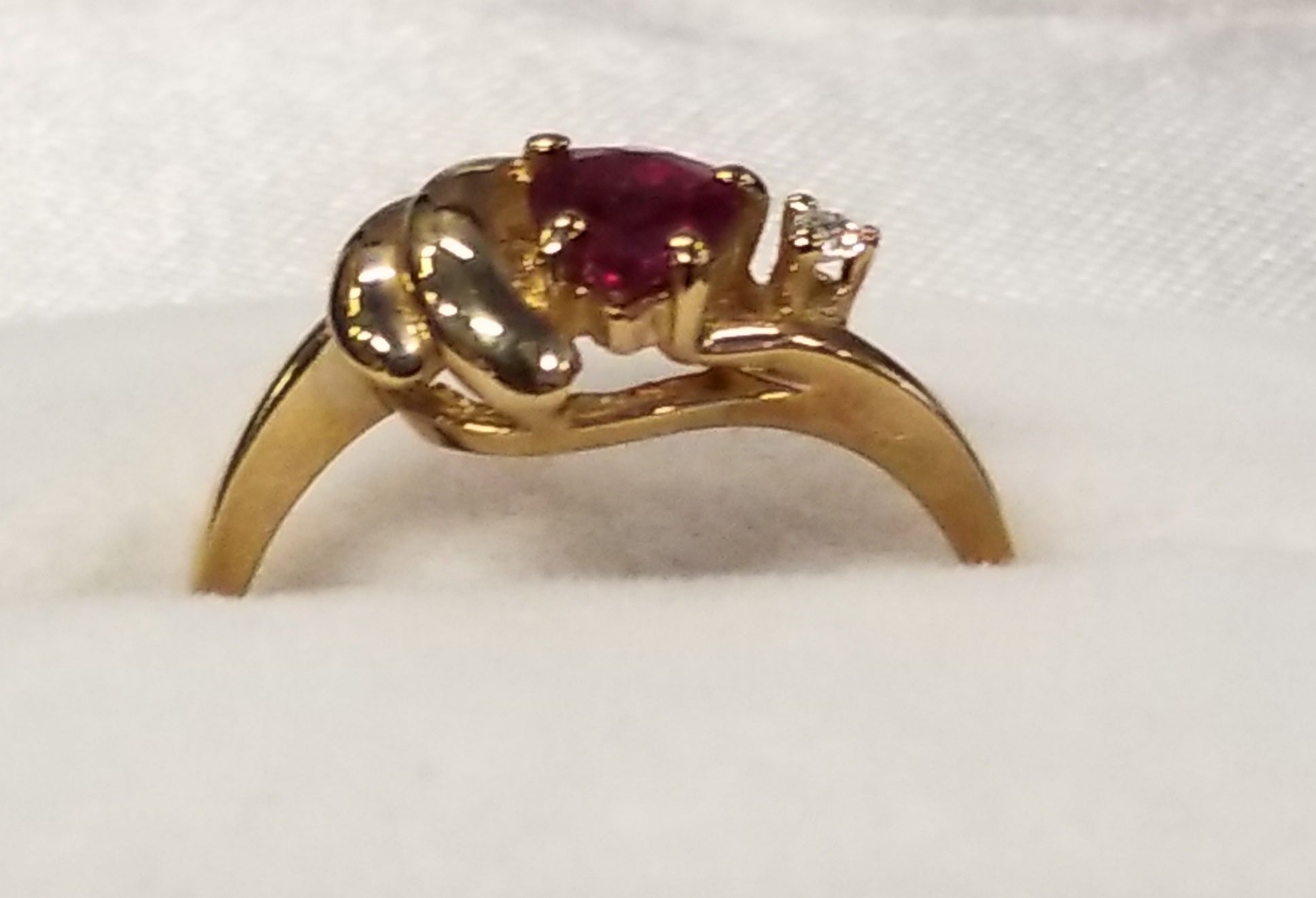Pear Shape Ruby Ring and Diamonds