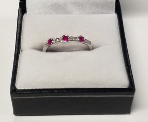 Three Round Cut Ruby Ring with Diamond Accents